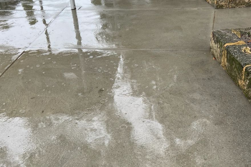Before and after paint removal on concrete slab: after