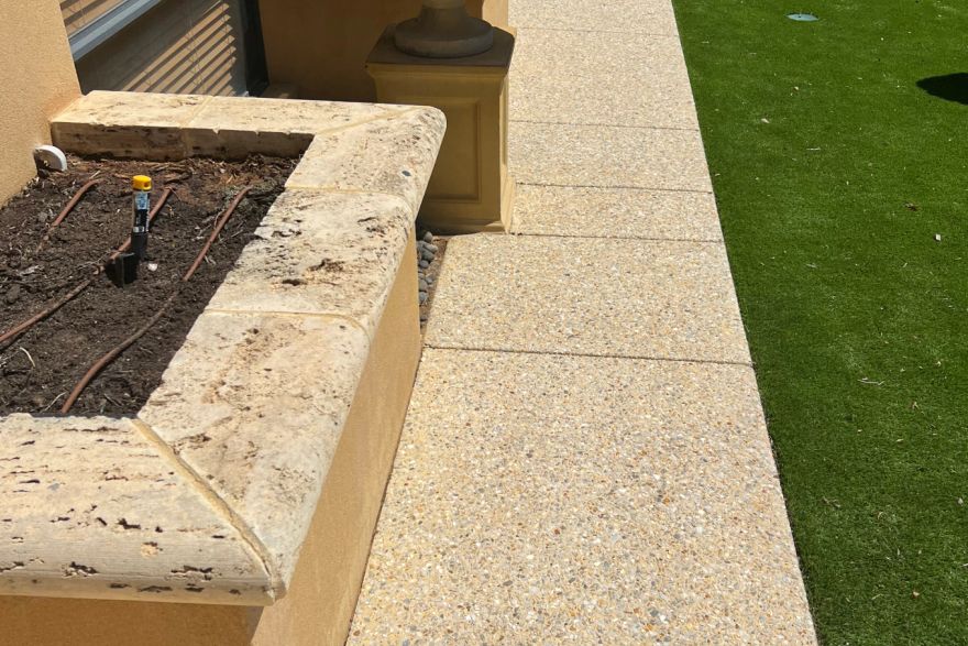 Before and after cleaning on concrete exposed aggregate · Path: after