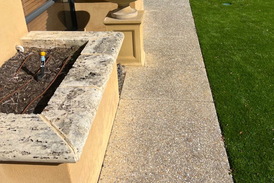 Before and after cleaning on concrete exposed aggregate · Path: before