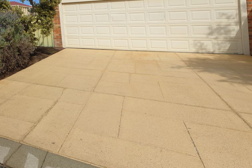 Before and after cleaning on liquid limestone · Driveway: after