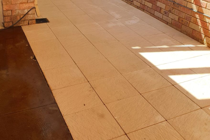 Before and after cleaning on sandstone pavers: after