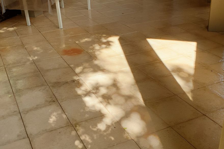 Before and after cleaning on sandstone pavers: after