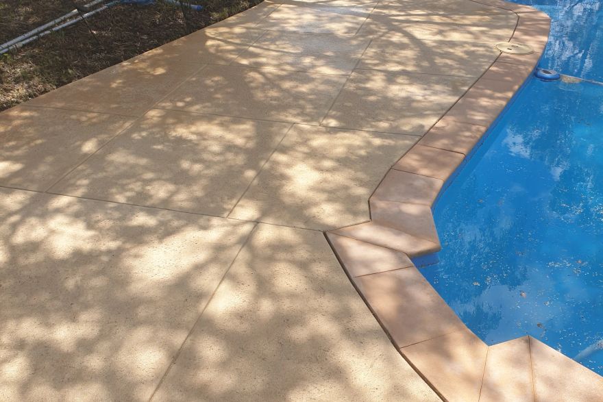 Before and after cleaning on liquid limestone · Poolside: after