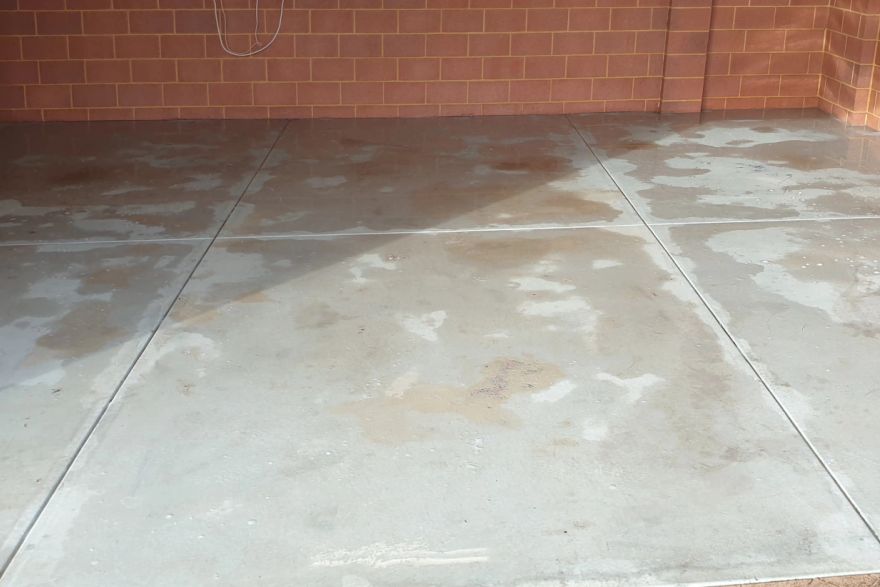 Before and after cleaning on concrete slab · Garage floor: after