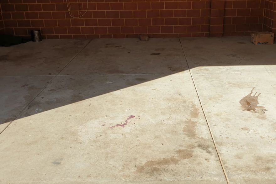 Before and after cleaning on concrete slab · Garage floor: before