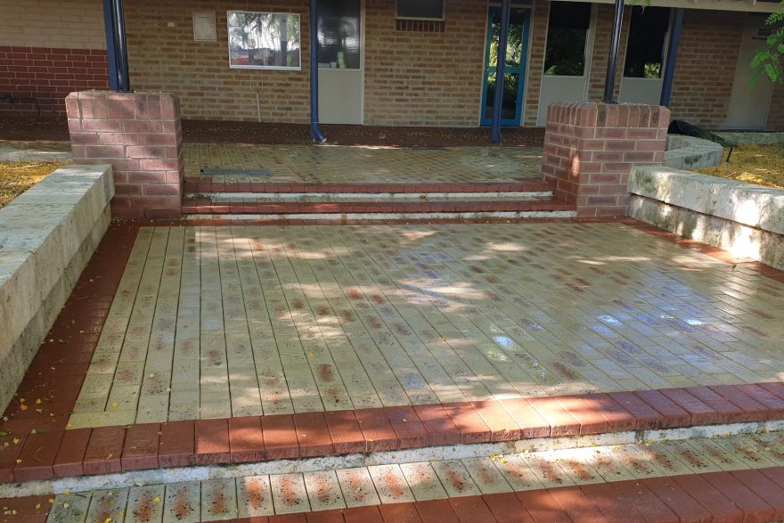 Before and after cleaning on brick pavers: after