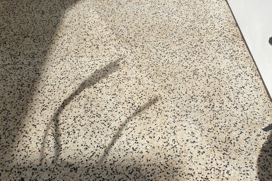 Before and after rust / bore stains on concrete exposed aggregate: after