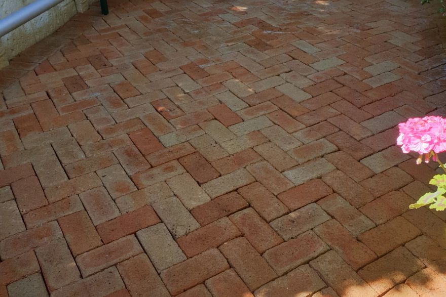 Before and after cleaning on brick pavers: after