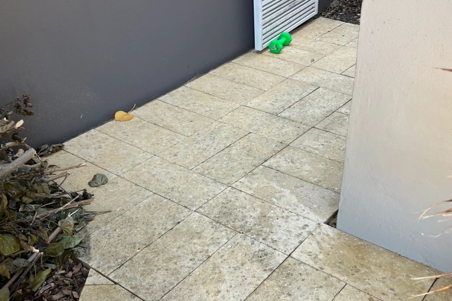 Before and after cleaning on natural stone · Path: after