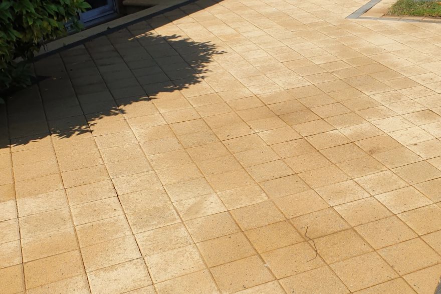 Before and after cleaning on brick pavers: after