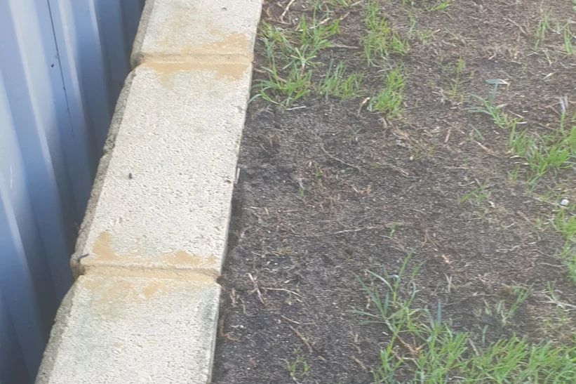 Before and after cleaning on limestone block: after