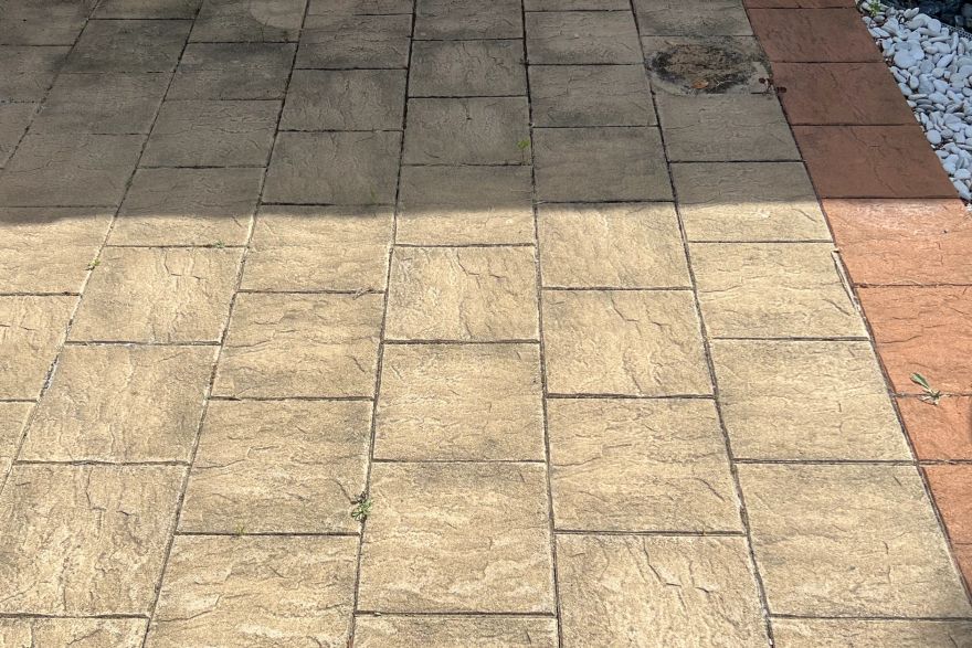 Before and after cleaning on brick pavers: before