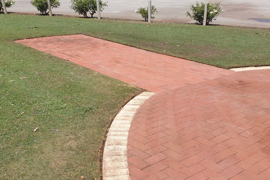 Before and after rust / bore stains on brick pavers: after