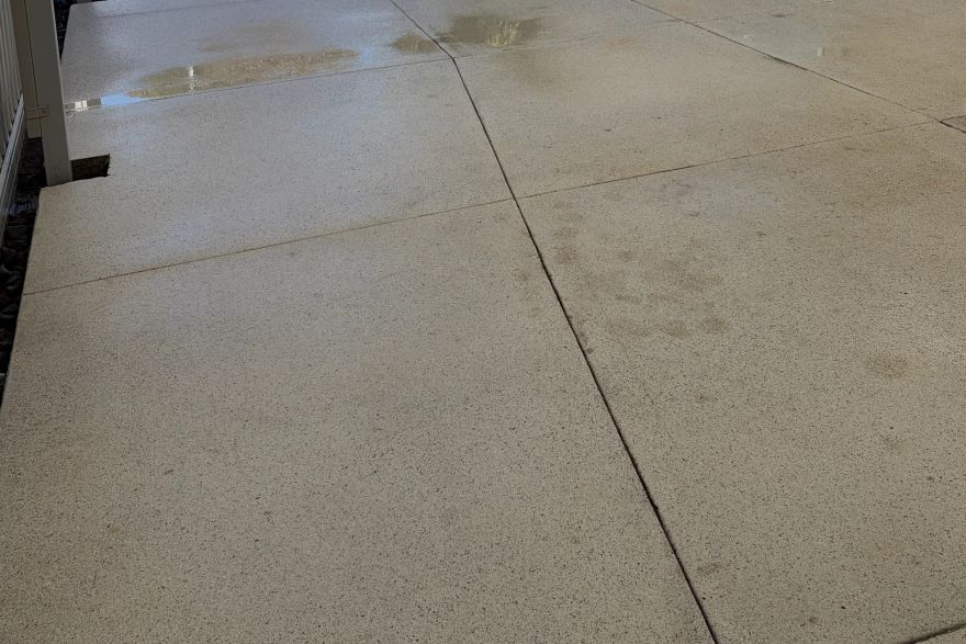 Before and after rust / bore stains on concrete exposed aggregate: after