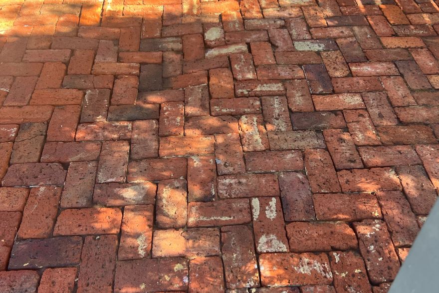 Before and after cleaning on brick pavers: after
