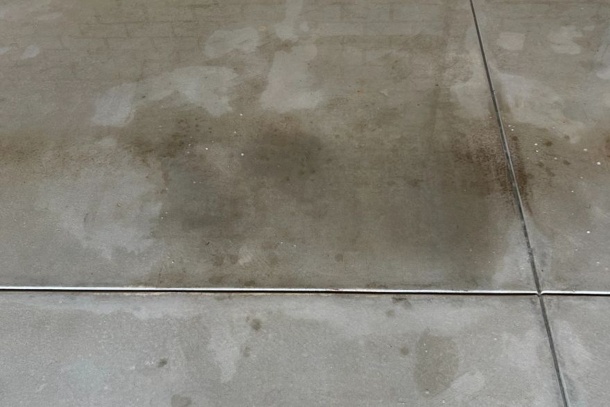 Oil stains on concrete: after