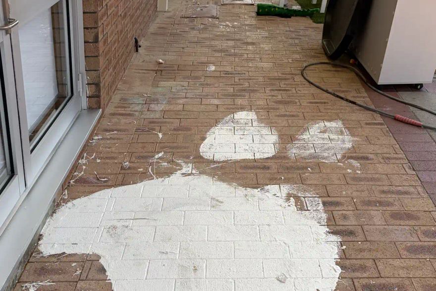 Paint spilled on a job site: before
