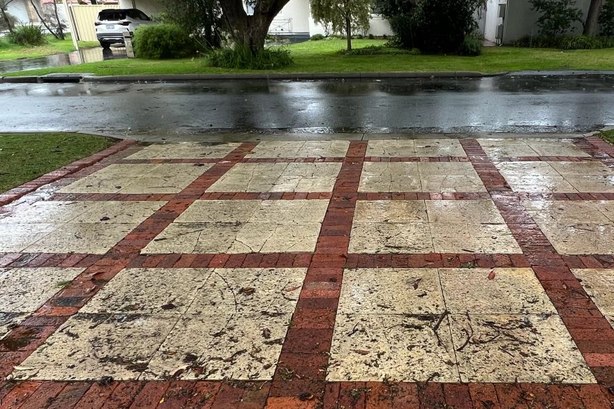 Driveway paving cleaned: before