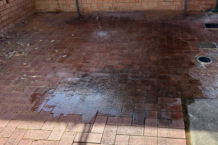 Red brick courtyard cleaning: before