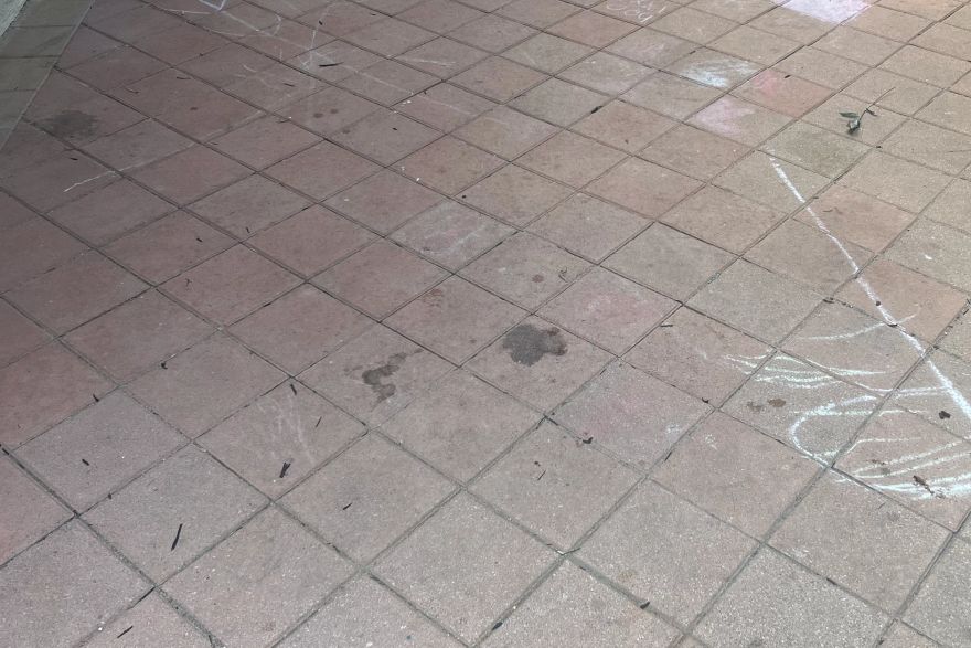 Paint removal from outdoor paving: before